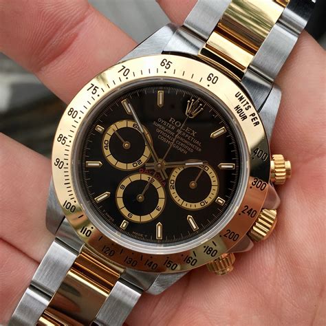 rolex daytona gold and black|daytona rolex gold price.